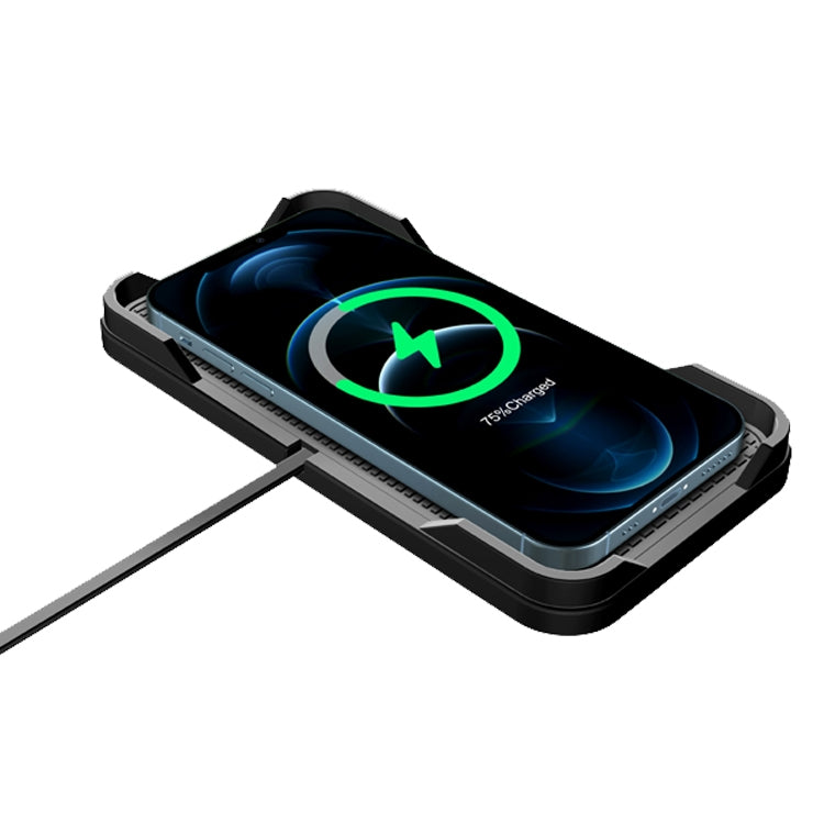 Car wireless charger with phone placed on pad, green charging ring on dark gray