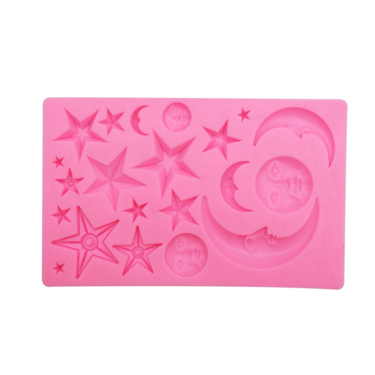 Pink silicone mold with star and crescent moon face relief cavities for chocolate or clay