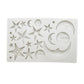 White silicone mold with star, crescent moon, and baby face relief cavities