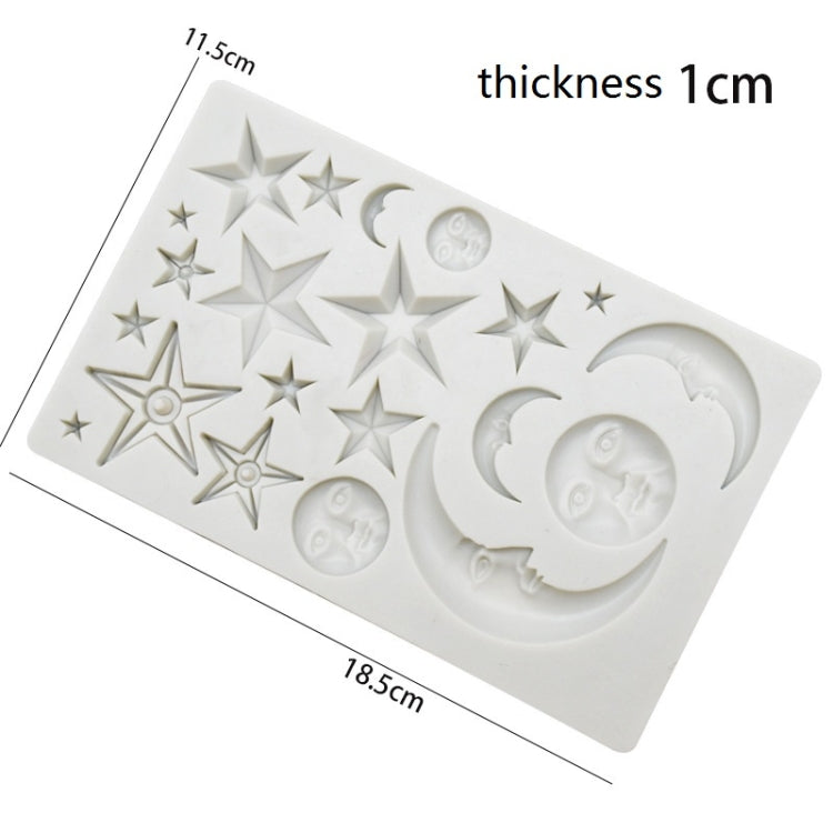 White silicone mold with star, crescent moon, and baby face relief cavities