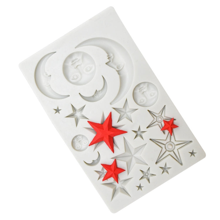 White silicone mold with crescent moon and star relief cavities, with red star inserts