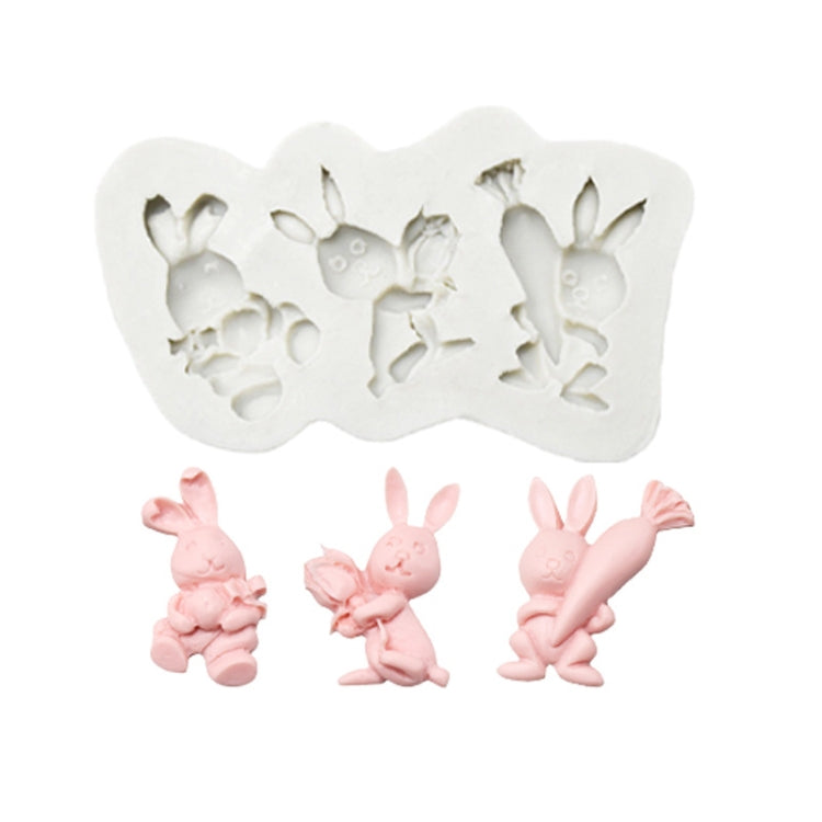 Silicone chocolate mold set with rabbit figures, showing three bunny shapes in cavities