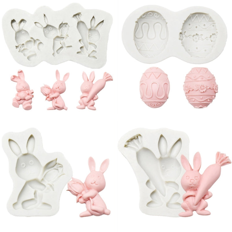 Silicone chocolate mold set with multiple rabbit and egg cavities, plus molded pink pieces