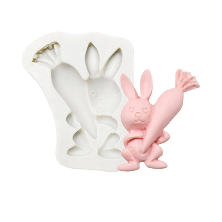 Silicone chocolate mold with standing bunny relief and molded pink bunny figure