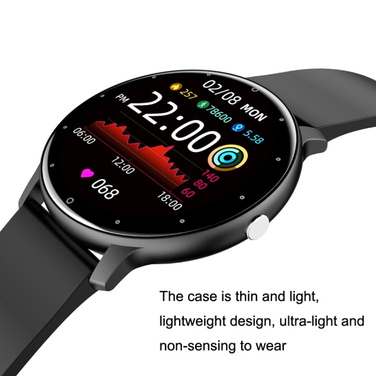 Black smartwatch close-up with round screen and sporty silicone strap