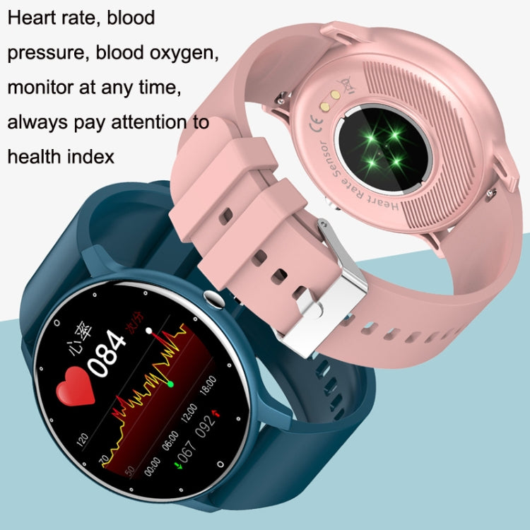 Teal and pink smartwatches with round screens and silicone wrist bands