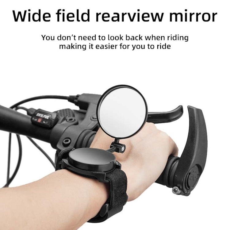 Bicycle rearview mirror with black wrist strap, wide round mirror mounted near handlebar controls