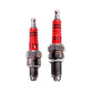 Two motorcycle spark plugs with red insulators and threaded metal tips