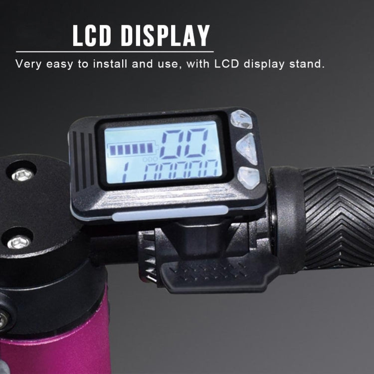 Close-up black scooter LCD display controller with screen and button controls