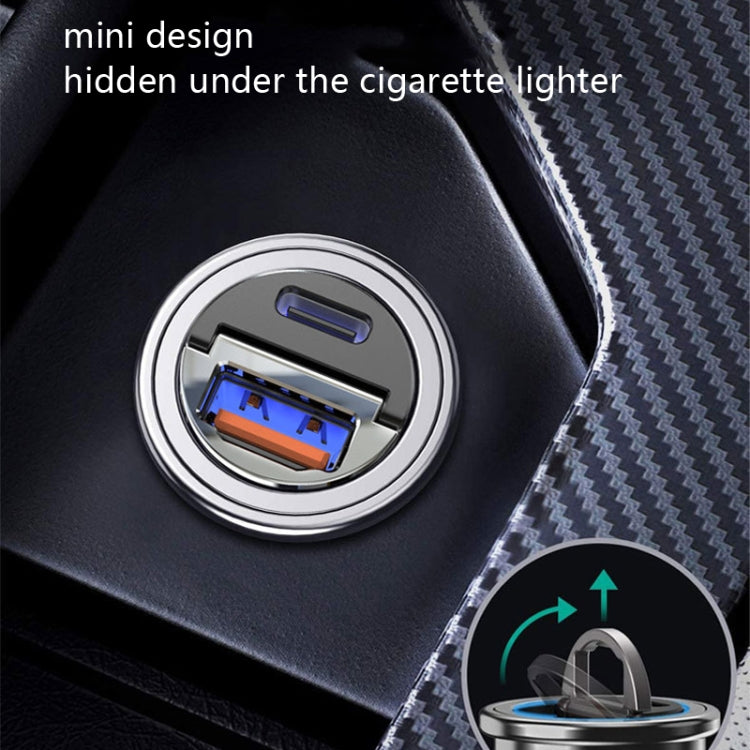 Car cigarette lighter fast charge plug inserted in socket, blue-lit dual ports