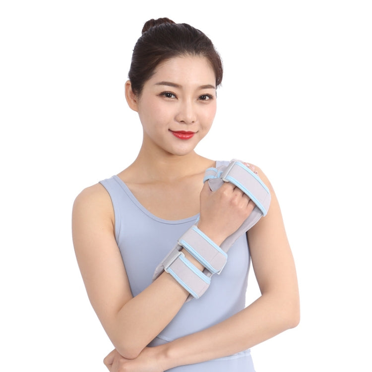 Wrist splint with light-blue padded straps and grey brace, worn on forearm