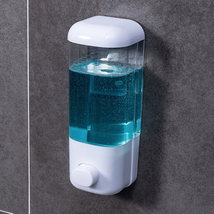 Wall-mounted manual soap dispenser, clear refill bottle with blue soap and one push button