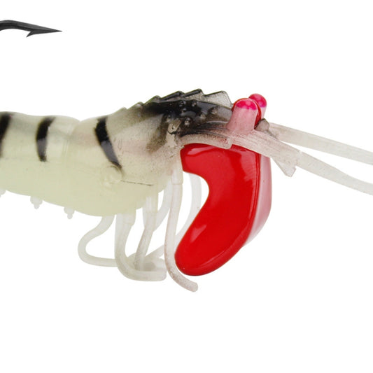 Soft shrimp lure with red lead head, black-and-white body pattern, single sharp hook