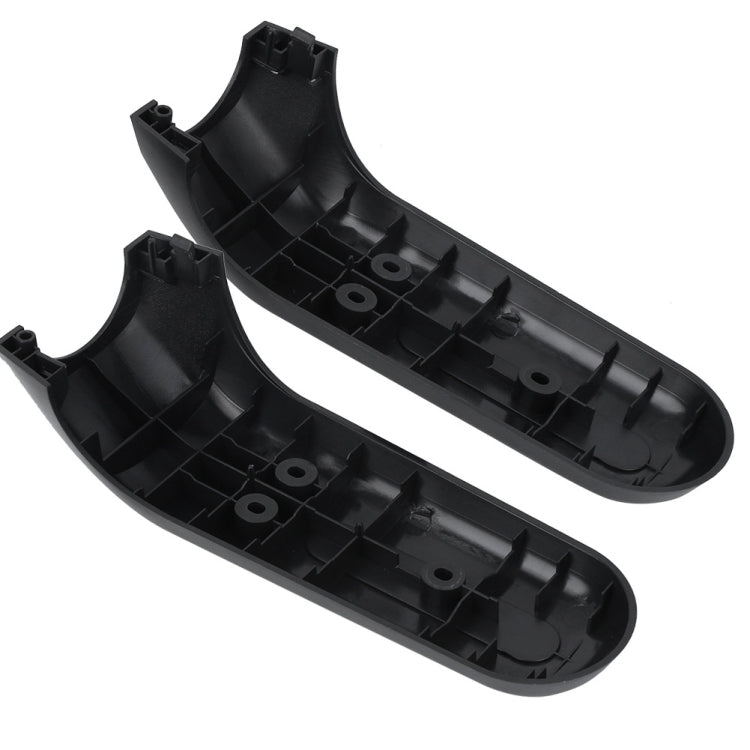 Pair of black front fork protection covers, underside view with molded channels and holes