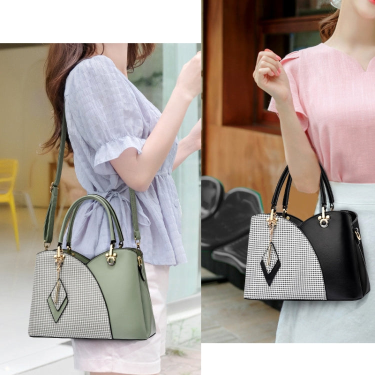 Two-tone lattice handbags on model: green top with check panel, and black top with check panel