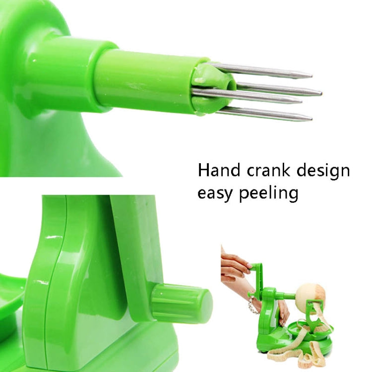 Green fruit peeler front with metal fork blades and crank handle