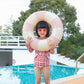 Pink-and-white striped inflatable underarm swimming ring, worn around arms