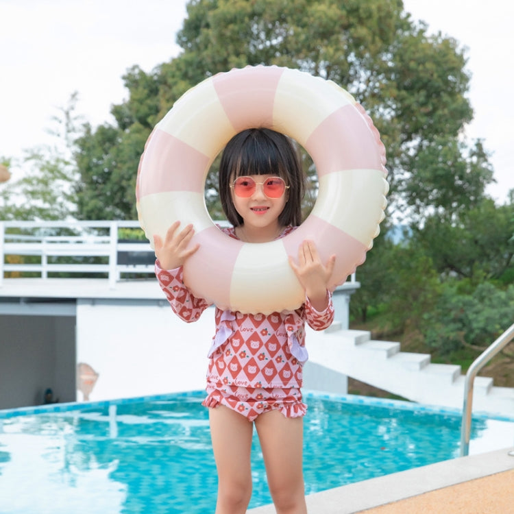 Pink-and-white striped inflatable underarm swimming ring, worn around arms