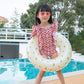 White inflatable underarm swimming ring with tiny cherry prints