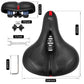 Black shock bike saddle with textured traction pads and visible underside spring mechanism.