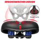 Black bike saddle with red center stripe and visible suspension springs underneath.