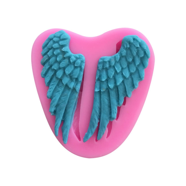 Angel wing silicone cake mold, pink heart shape with teal wing cavities