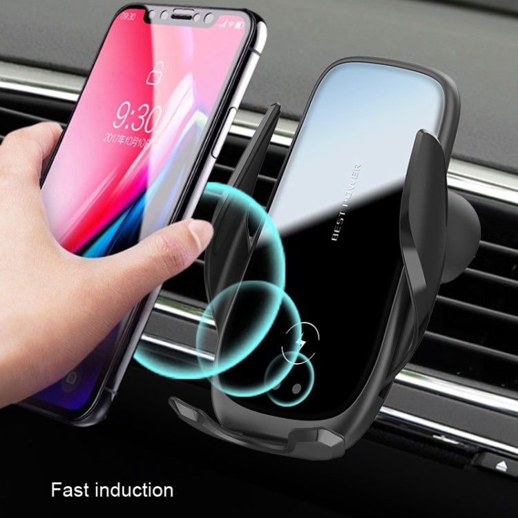 Black air-vent wireless charging bracket holding a phone with charging indicator glow