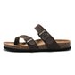 Brown cork slide sandals with two adjustable buckles, open-toe comfort sole