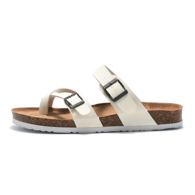 Ruizu cork sandals with white double straps, buckle hardware, and brown outsole
