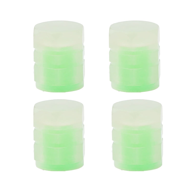 Set of 4 luminous green tire valve caps with split-effect translucent design