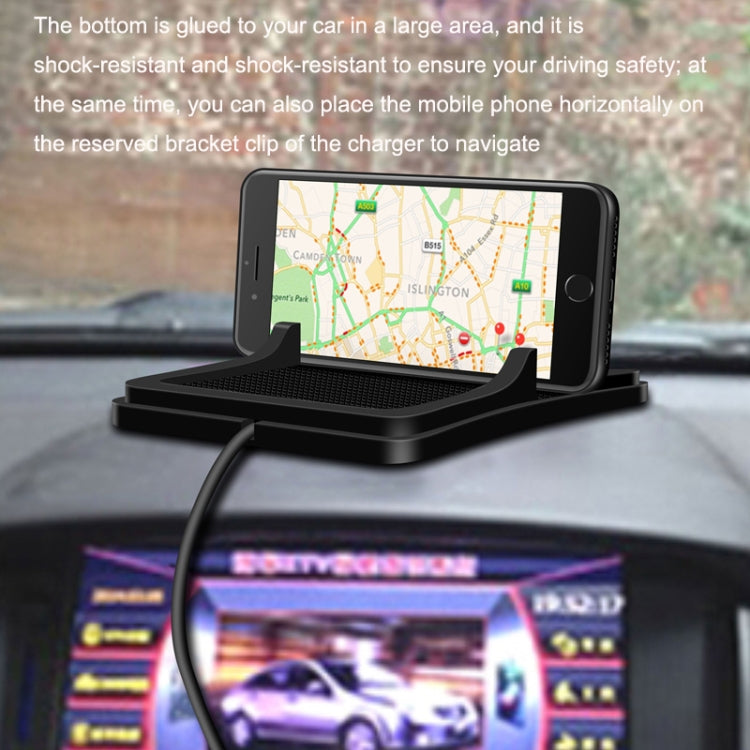Black wireless charger mount with smartphone displaying navigation map