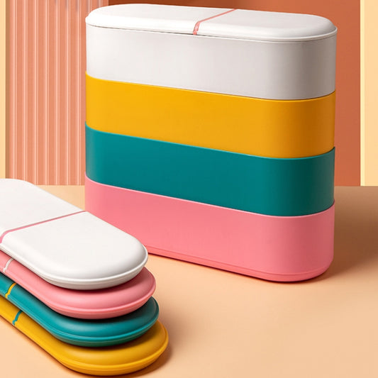 Stacked multi-color storage cases for batteries and cables with pink snap straps