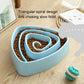 Large blue triangular anti-choking slow-feed dog bowl filled with dry kibble