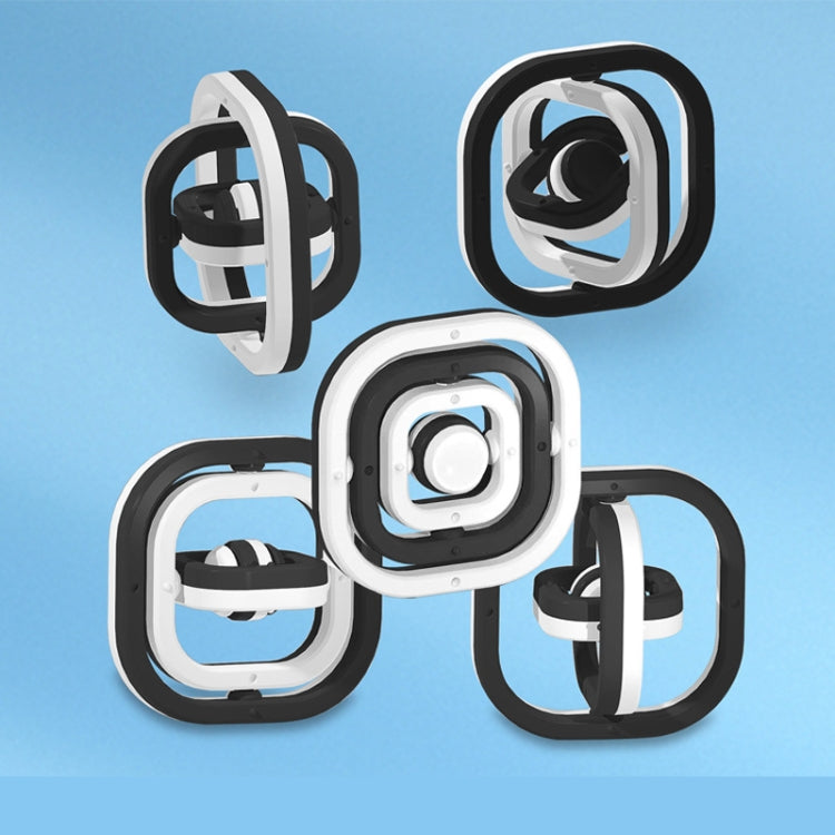 Three fingertip decompression flip toys, black and white, upright and angled