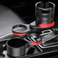 Car cup holder installed on center console, rotating slots with dark cup inserts