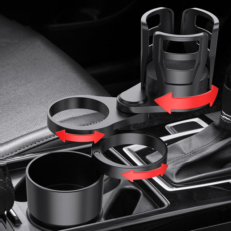Car cup holder installed on center console, rotating slots with dark cup inserts