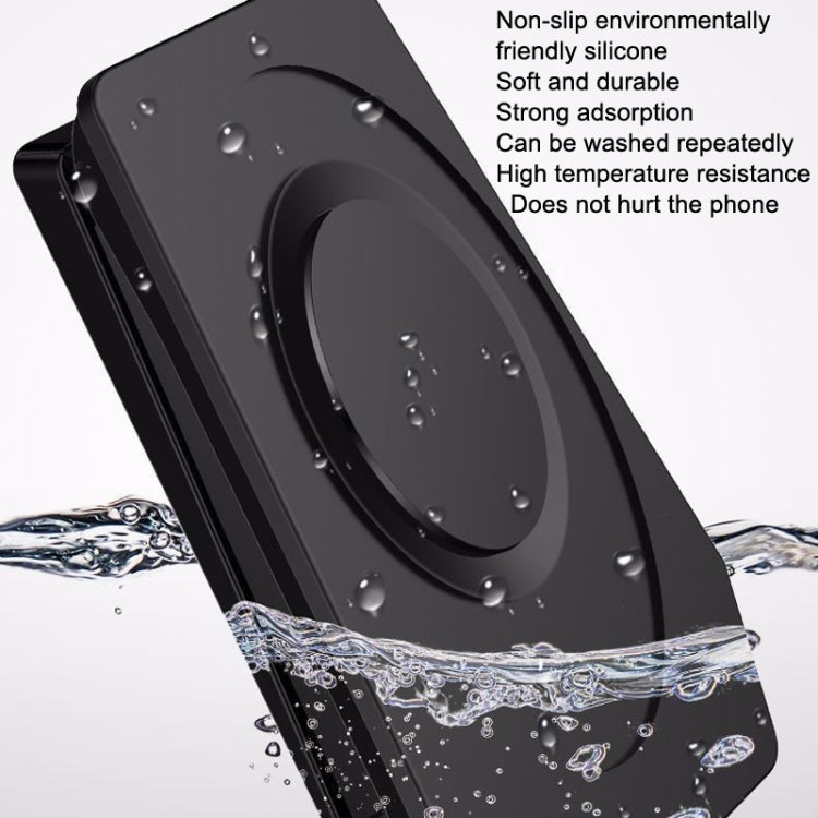 Black car phone/tablet holder with suction pad and cradle, shown with water droplets