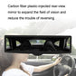 Car interior auxiliary rearview mirror mounted on windshield area, long rectangular
