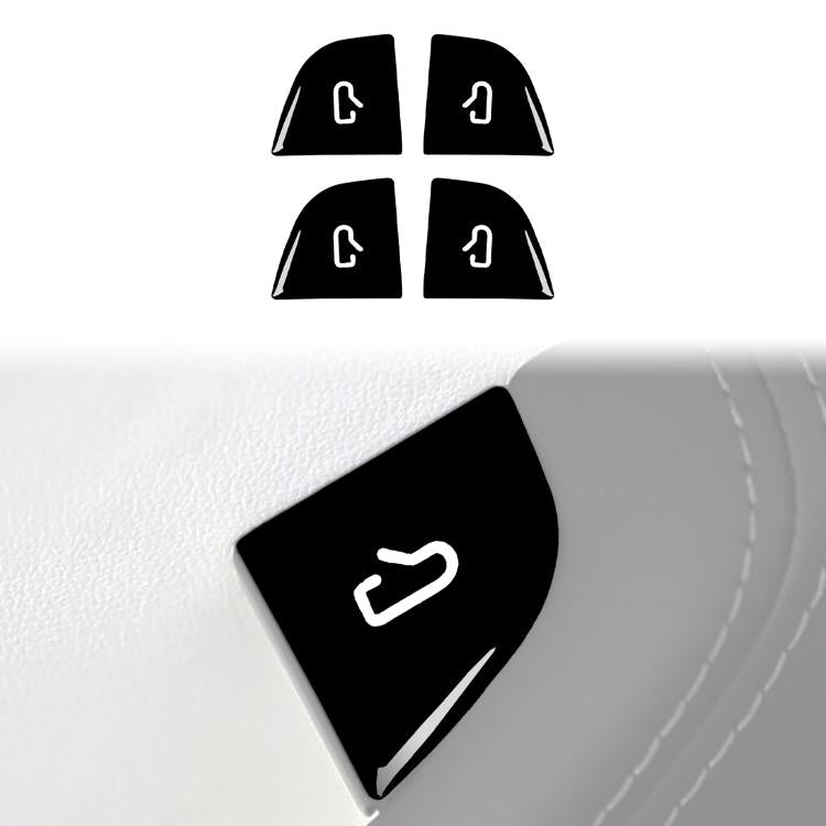 Four black window switch sticker pieces with white button-arrow icons