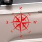 Red compass rose car body sticker with N E S W directions and compass ring