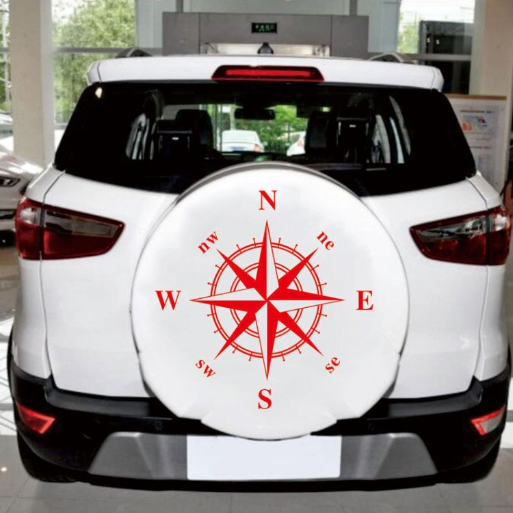 Red compass rose car sticker on rear spare-wheel cover with N E S W