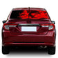 Red skull and flame skeleton rear window decal sticker on maroon car back glass