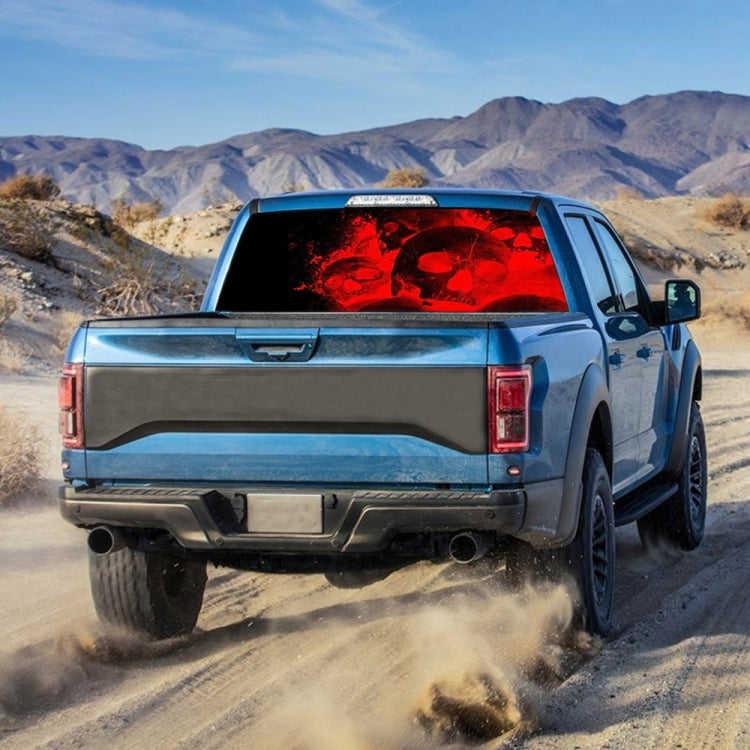 Red skull and flames skeleton rear window decal sticker on blue pickup back glass