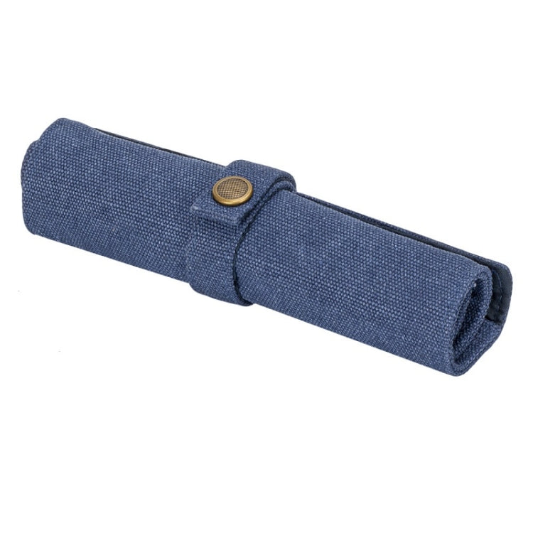 Blue nylon canvas watch strap storage bag, rolled with snap button closure.