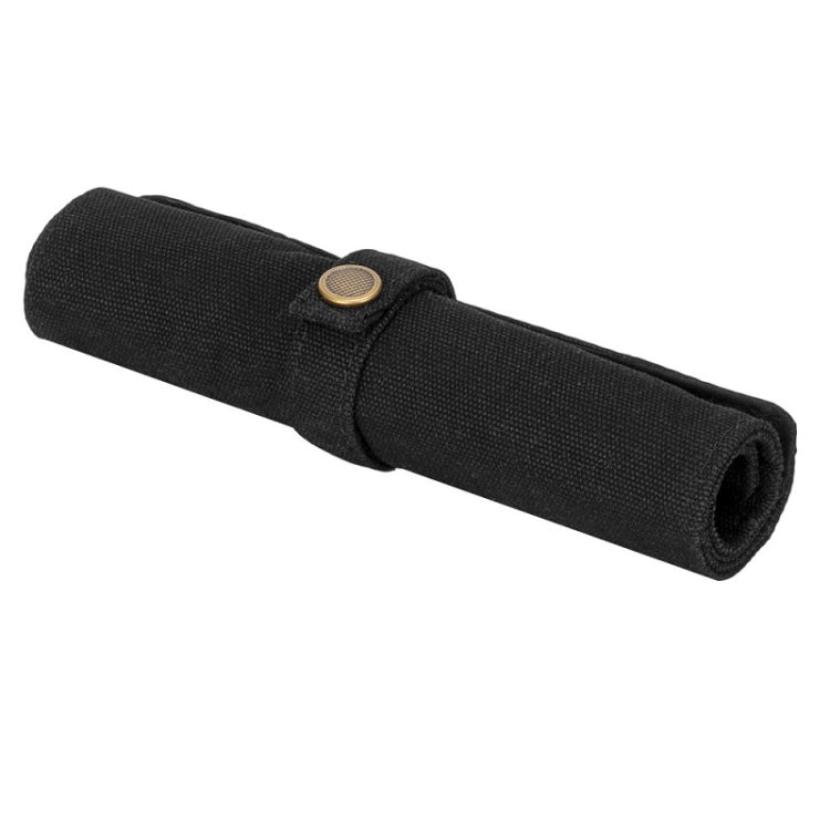 Black nylon canvas watch strap storage bag, rolled with snap button closure.