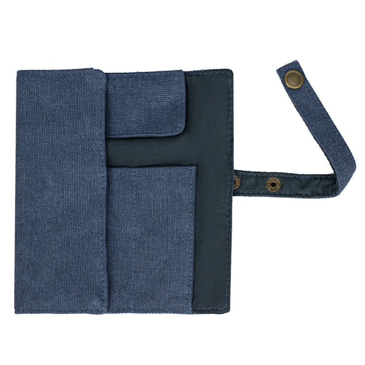 Blue nylon canvas watch storage pouch with flap pocket and attached carrying strap.