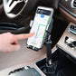 Car navigation phone mount mounted in cup holder, holding smartphone upright