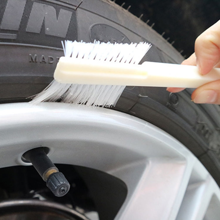 White stiff bristle brush for cleaning wheel and tire grooves and crevices