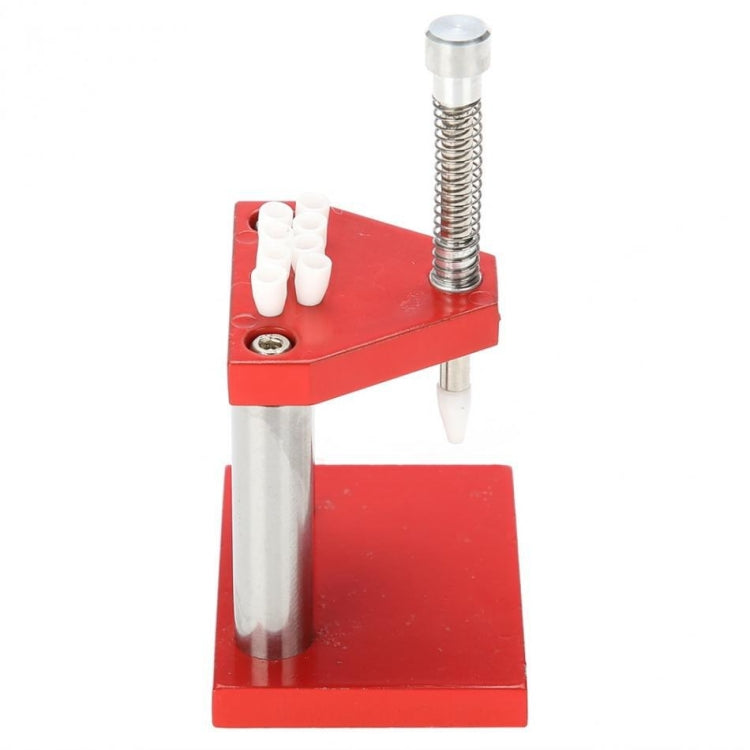 Watch hand plunger puller with red holder, spring-loaded needle, chrome posts, white dies