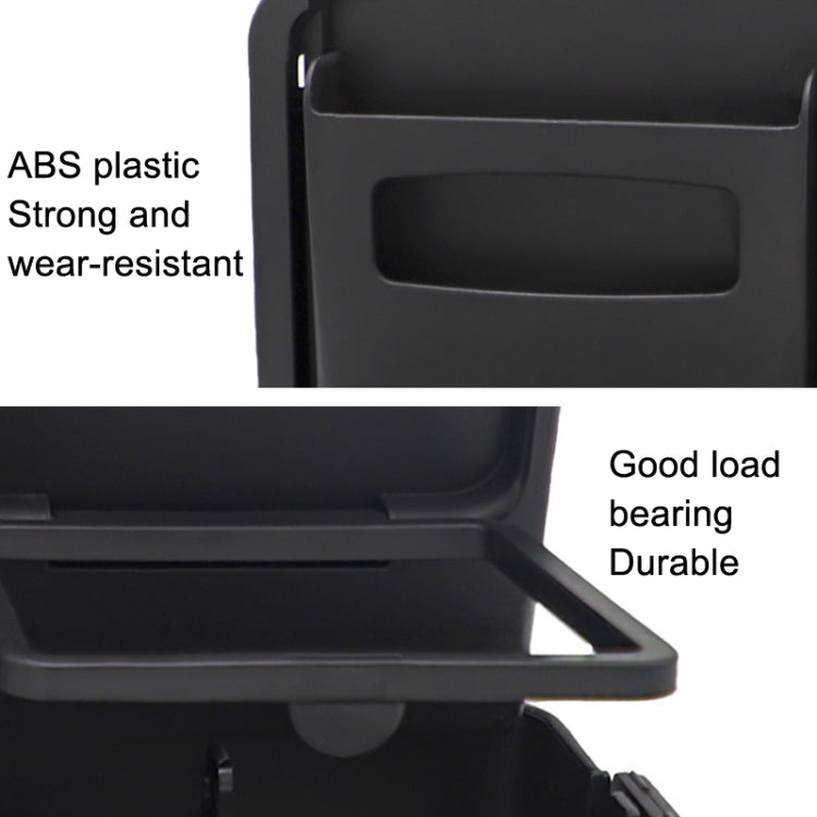 Close-up of black folding dining tray cup holder and sturdy plastic base
